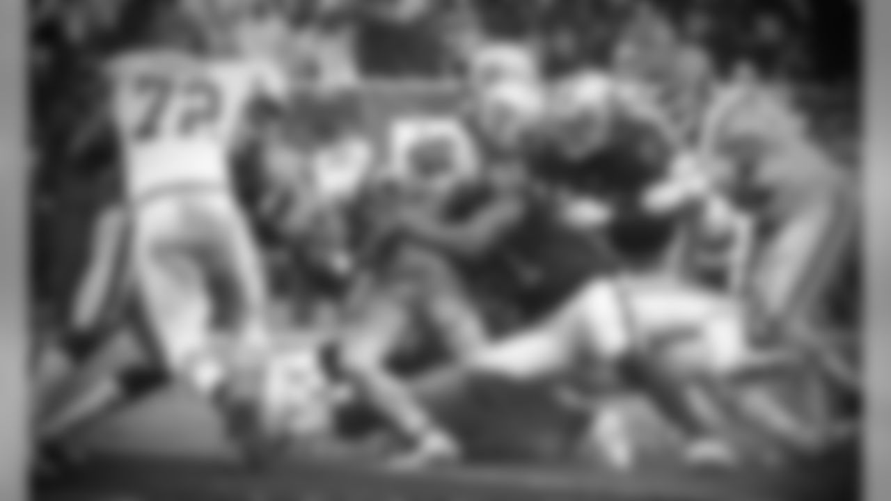 Kansas City Chiefs running back Spencer Ware (32) pushes the pile during the game against the Oakland Raiders, Sunday, October 16, 2016, in Oakland, California.