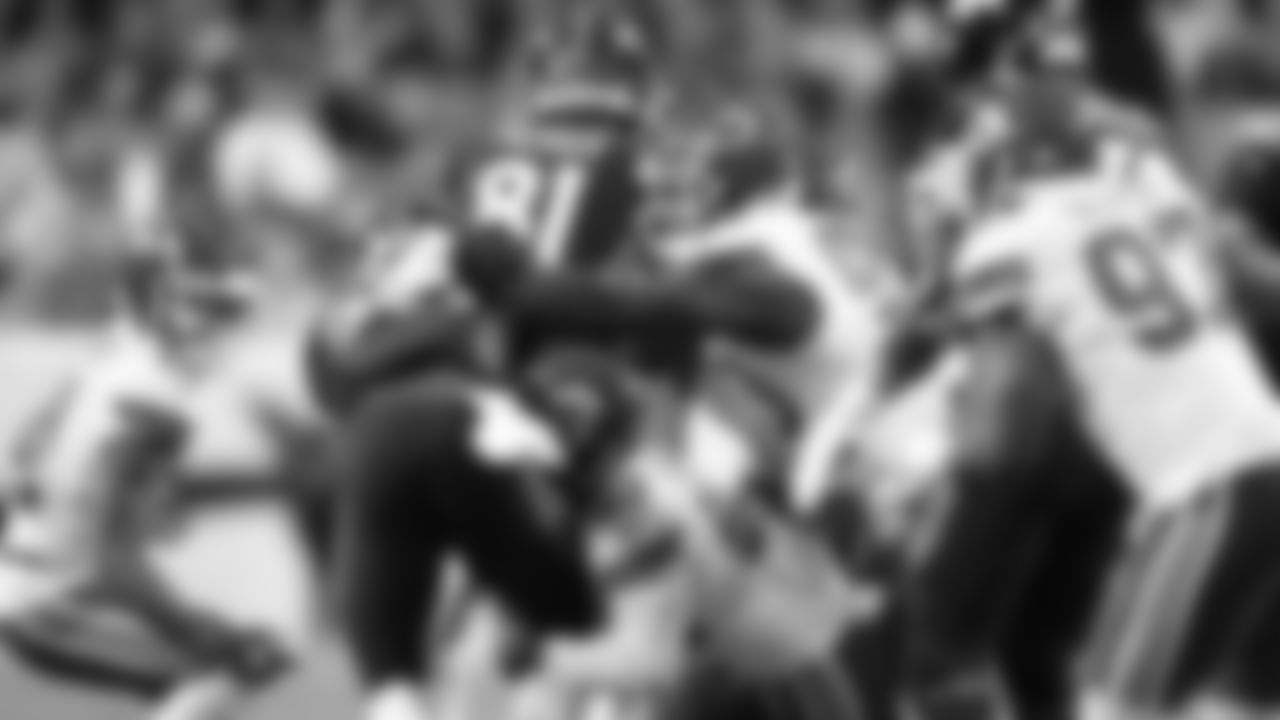 Kansas City Chiefs inside linebacker Anthony Hitchens (53) and defensive tackle Jarran Reed (90) during an NFL football game against the Denver Broncos on Saturday, January 8, 2021 in Denver.