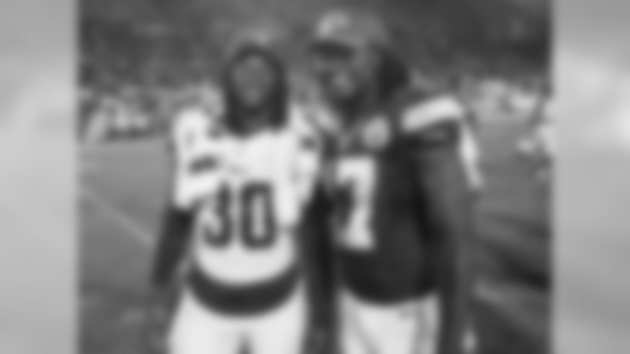 Los Angeles Rams running back Todd Gurley (30) and Kansas City Chiefs wide receiver Chris Conley (17) pose for a picture after the preseason game at the Los Angeles Memorial Coliseum on Saturday, August 20, 2016.