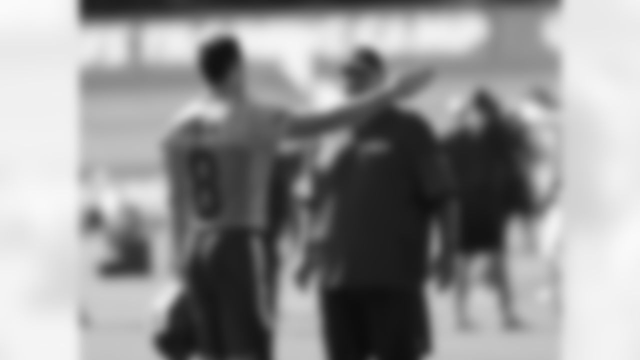 Kansas City Chiefs quarterback Kevin Hogan (8) talks to head coach Andy Reid at practice on the third day of training camp on Mosaic Life Care Field at the campus of Missouri Western State University on Friday, July 29, 2016.