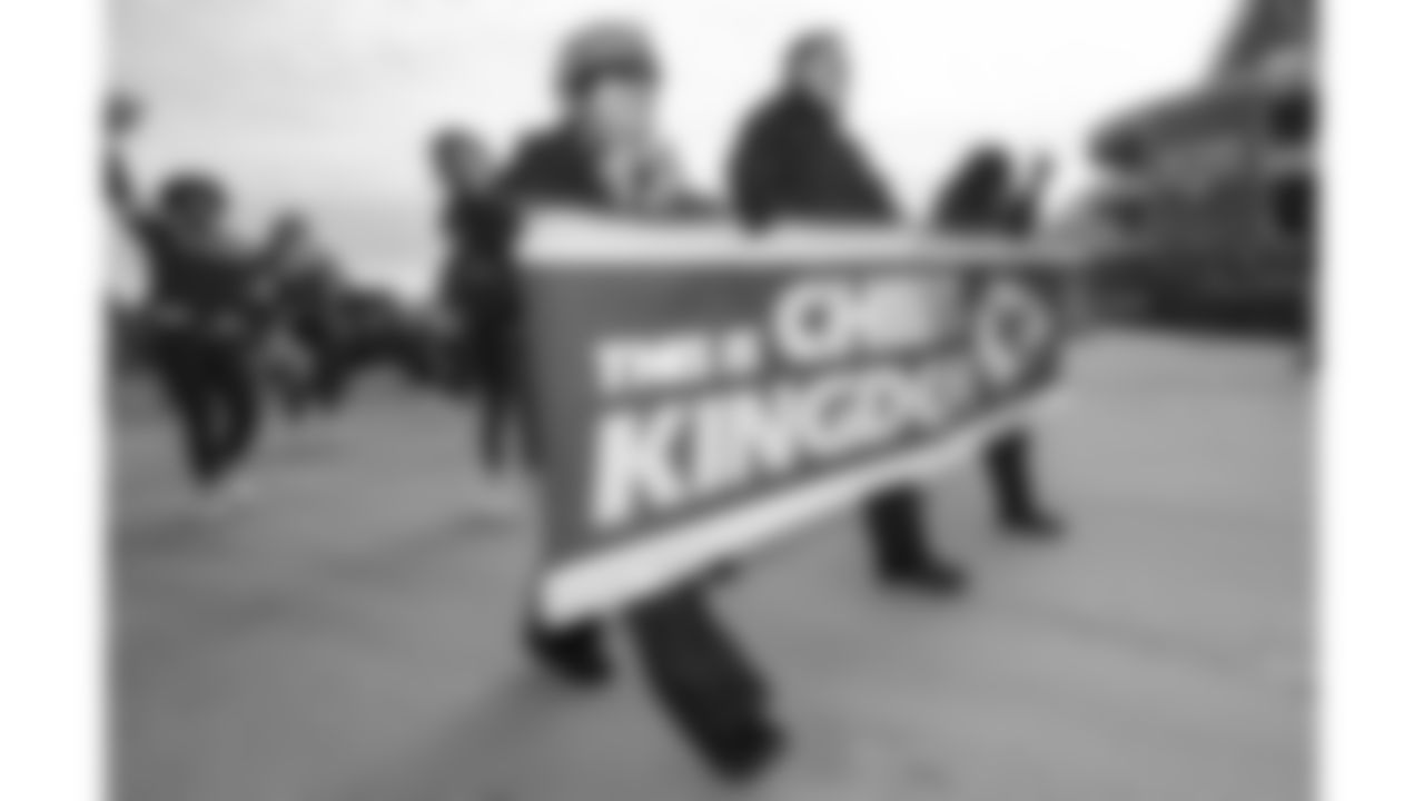 Red Coaters walk in the pregame parade prior to the divisional playoff football game against the Buffalo Bills, Sunday, January 23, 2022 in Kansas City.