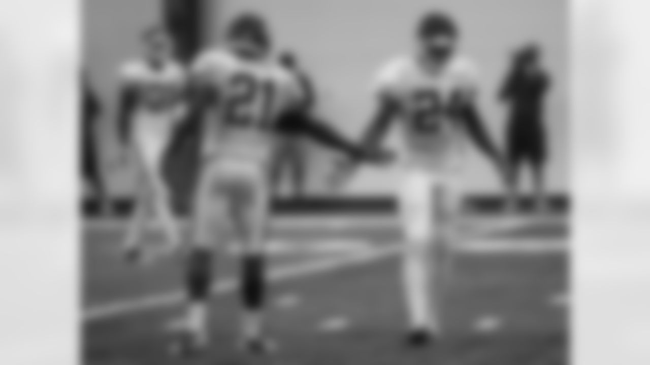 Kansas City Chiefs defensive back Eric Murray (21) high fives defensive back D.J. White (24) at practice on the sixth day of training camp on Mosaic Life Care Field at the campus of Missouri Western State University on Friday, August 5, 2016.