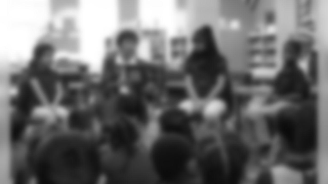 Kansas City Chiefs Red Coaters read to students at Wendell Phillips Elementary for Read Across America Day on March 2, 2020.