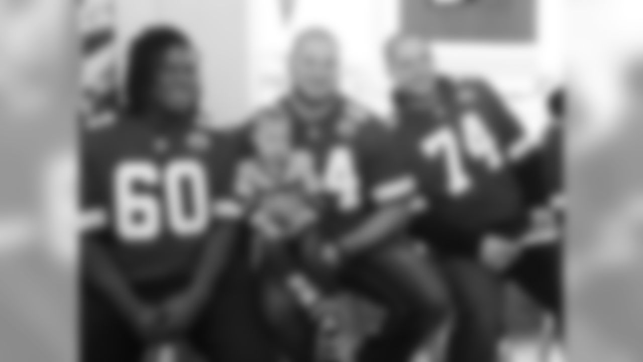 Chiefs offensive line visit local KFC to meet with fans and raise awareness for First Downs for Down Syndrome