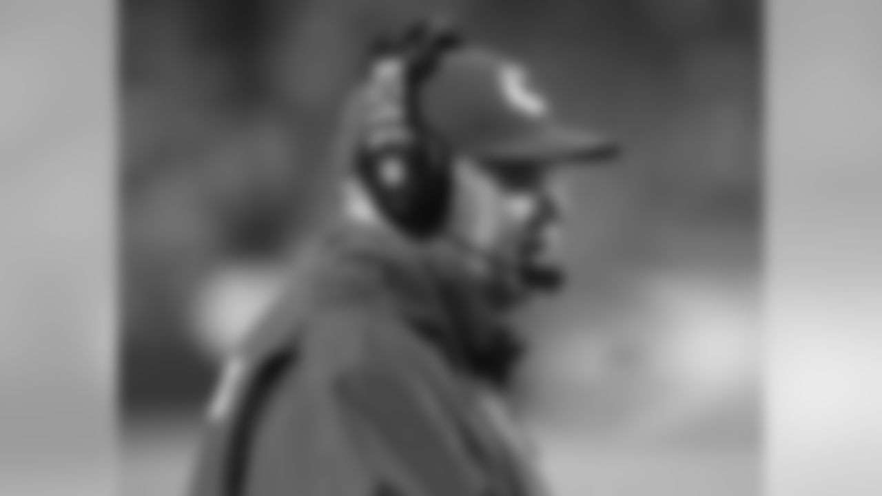 Kansas City Chiefs head coach Andy Reid talks on his headset during the 08-29-13 preseason game vs. Green Bay.