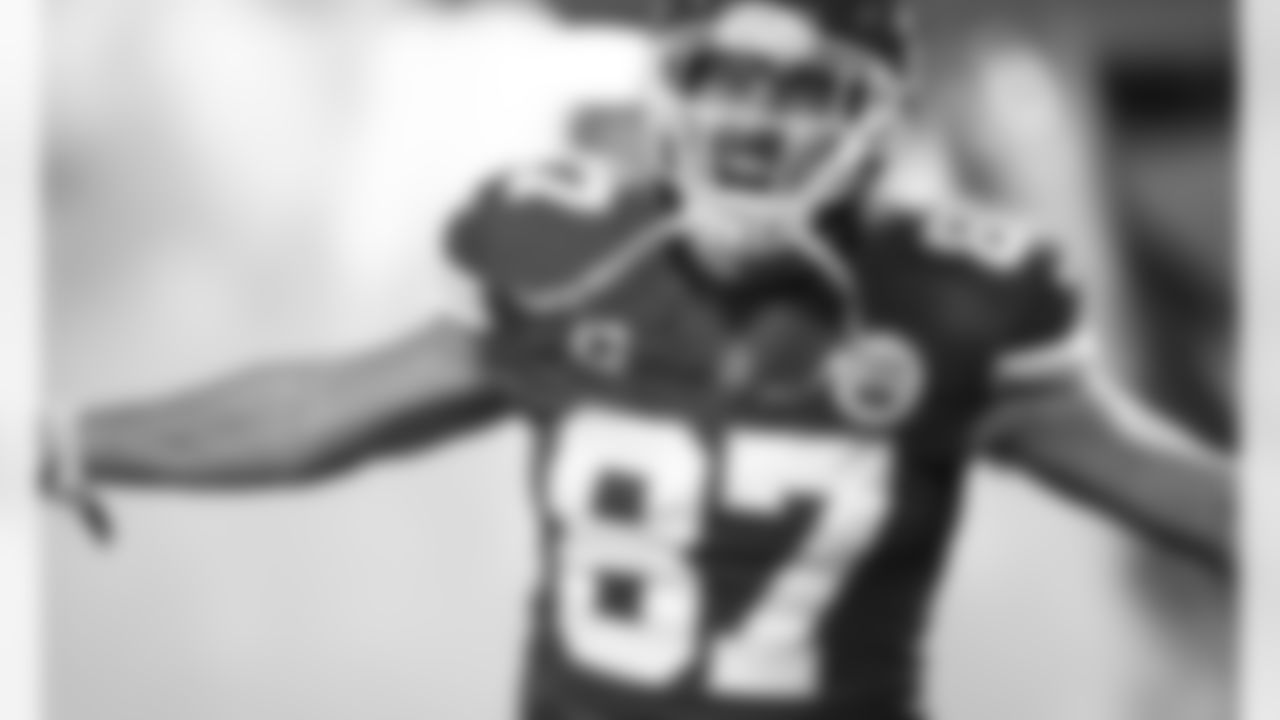 Kansas City Chiefs tight end Travis Kelce (87) yells while emerging from the smoke during player introductions prior to the AFC Championship football game, Sunday, Jan. 24, 2021 in Kansas City. (Andrew Mather/Kansas City Chiefs)