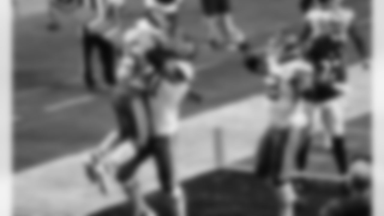 Kansas City Chiefs running back Clyde Edwards-Helaire (25) and offensive guard Andrew Wylie (77) during an NFL football game against the Las Vegas Raiders at Allegiant Stadium on November 22, 2020