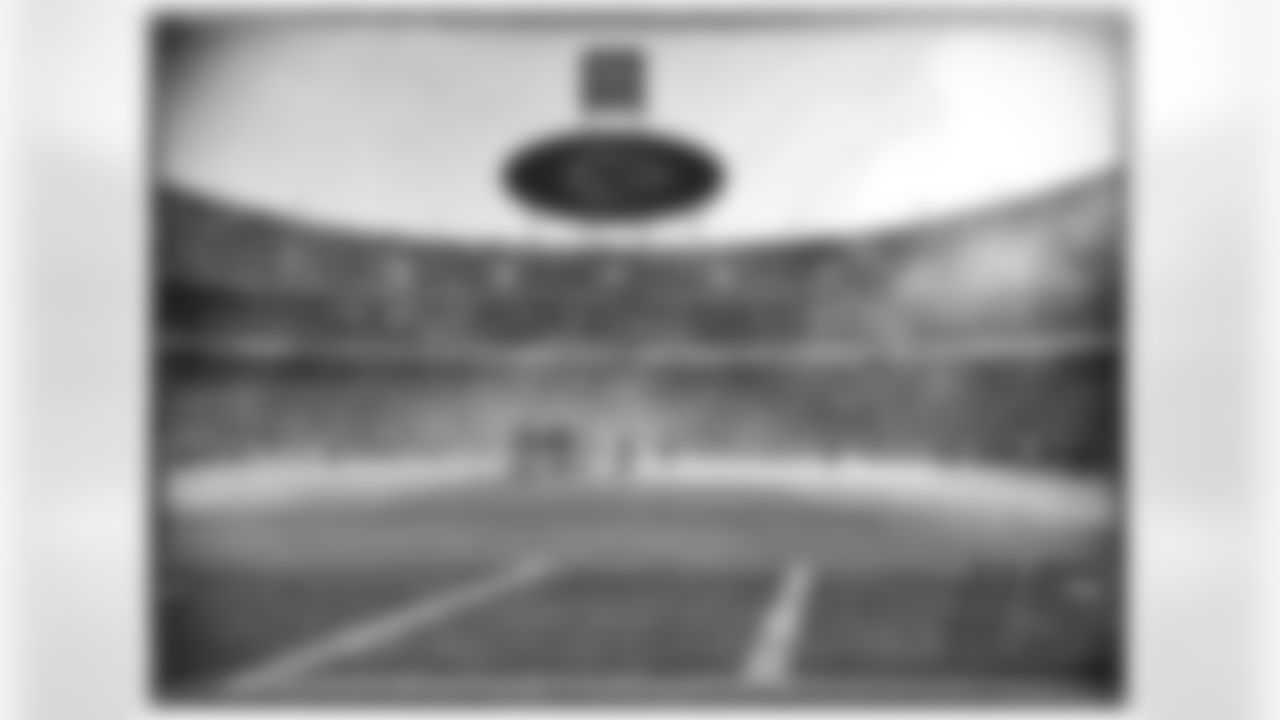 Sanders' comments: "To me, in this picture, if you take out the ArrowVision board, it looks like it could be old-time football. There's not real focus on any one player in particular. You've got the steam and the fog coming off the field from the heat coming off our coils that we put in meeting the cold air, and it just looks so cold. I just thought it was interesting how that looked. Again, it's in black and white, which makes it probably feel even colder, and it was cold. It was the coldest game I've ever shot a picture in."