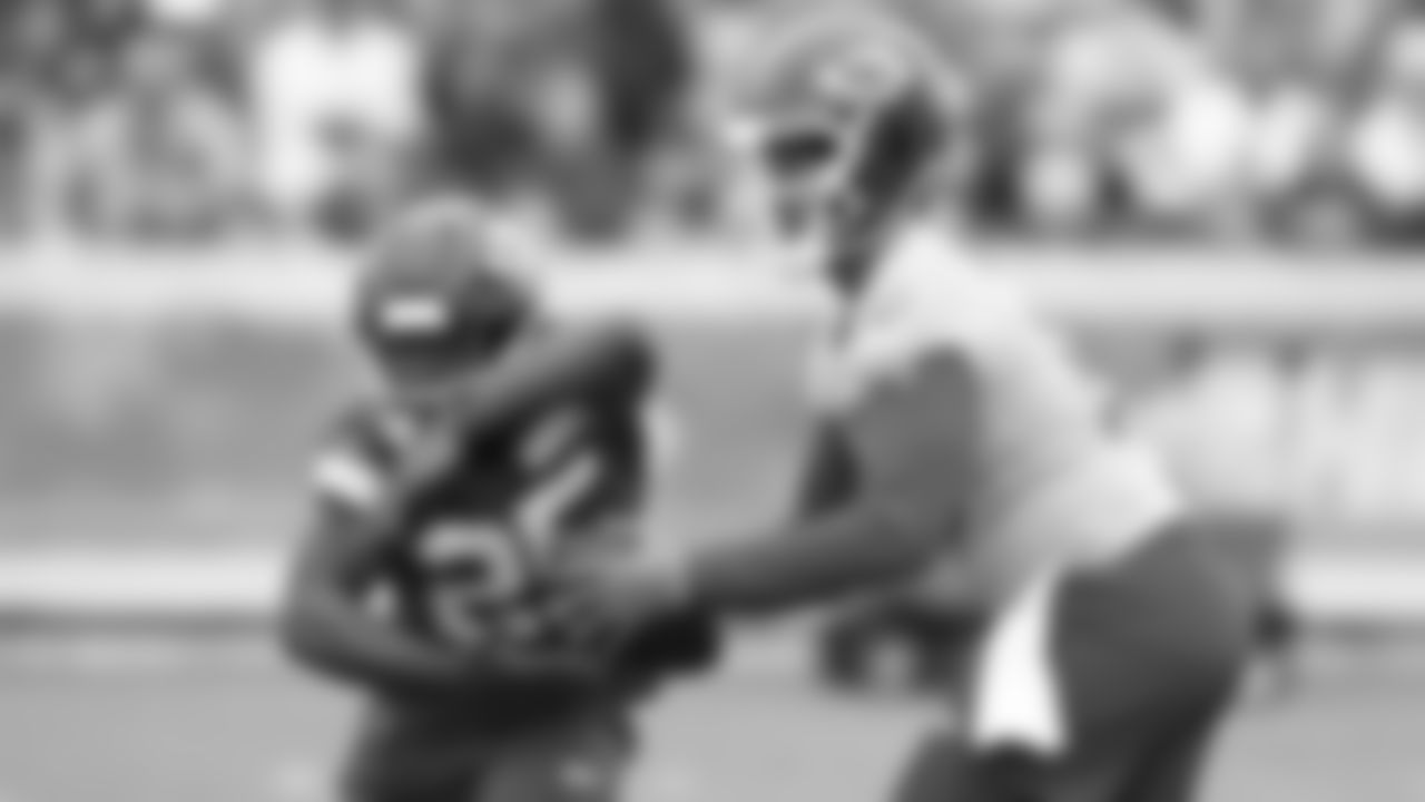 Kansas City Chiefs quarterback Patrick Mahomes (15) fakes a hand off to running back Clyde Edwards-Helaire (25) during training camp at Missouri Western State University.