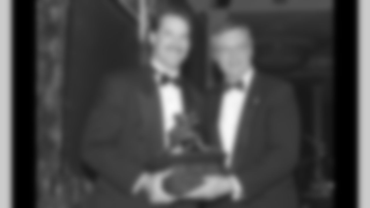 Bill Cowher and Marty Schottenheimer present an award at the 1995 101 Awards.