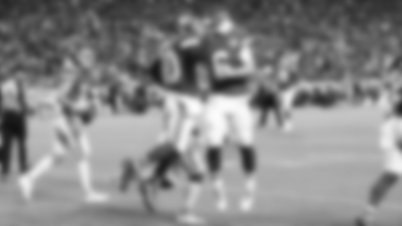Kansas City Chiefs running back Derrick Gore (40) celebrates his touchdown run with Kansas City Chiefs quarterback Shane Buechele (6) during a NFL preseason football game against the Minnesota Vikings, Friday, August 27, 2021 in Kansas City.