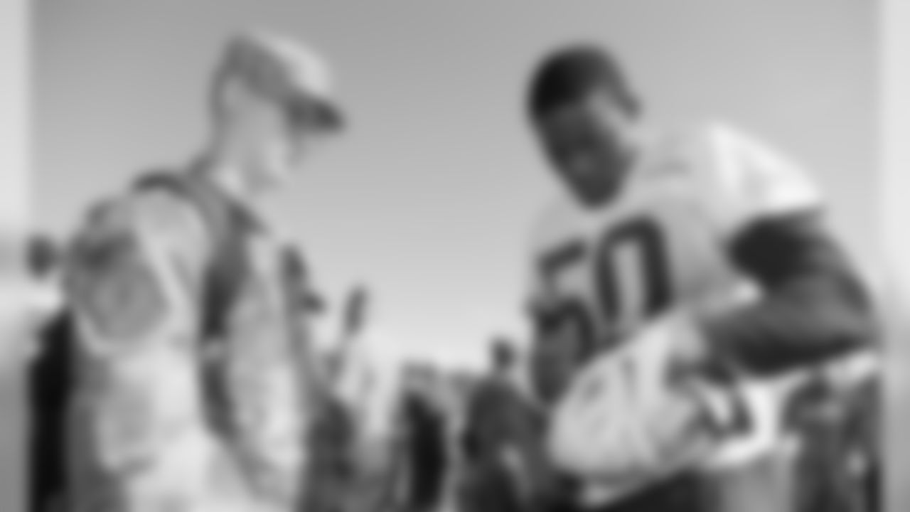 Kansas City Chiefs Linebacker Darron Lee (50) signs autographs for fans after a 2019 Training Camp practice at Missouri Western State University in St. Joseph, MO.