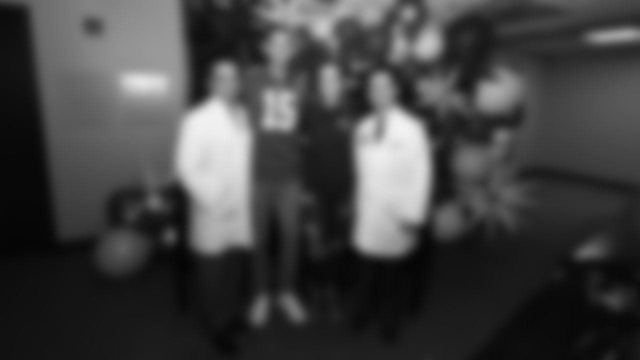 Dr. Mazin Al-kasspooles, MD, FACS, Austin Hill, Andrea Hill, and Weijing Sun, MD, FACP at The University of Kansas Health System Infusion Center on Tuesday, October 3, 2023 in Kansas City, MO.