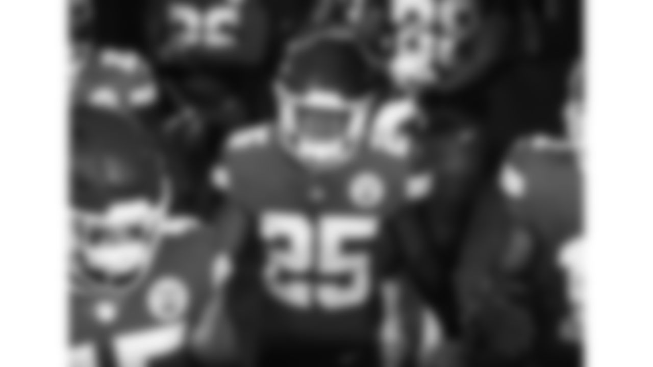Kansas City Chiefs running back Clyde Edwards-Helaire (25) walks out of the tunnel with his teammates prior to an NFL football game against the Buffalo Bills, Sunday, October 10, 2021 in Kansas City.