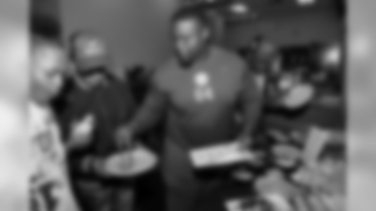 Laurent Duvernay-Tardif, along with the help of his teammates, explains the basics of healthy living and nutrition to a group of 20 young men from BoysGrow on Monday afternoon. The player-led initiative marked the second installment of the players' "4th Quarter Program" which seeks to address social justice areas of particular importance to the players themselves.