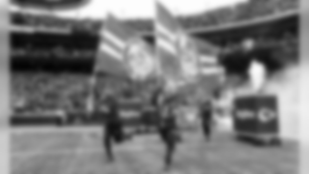 Flag Warriors prior to the game between the Kansas City Chiefs and the Los Angeles Chargers at Arrowhead Stadium.