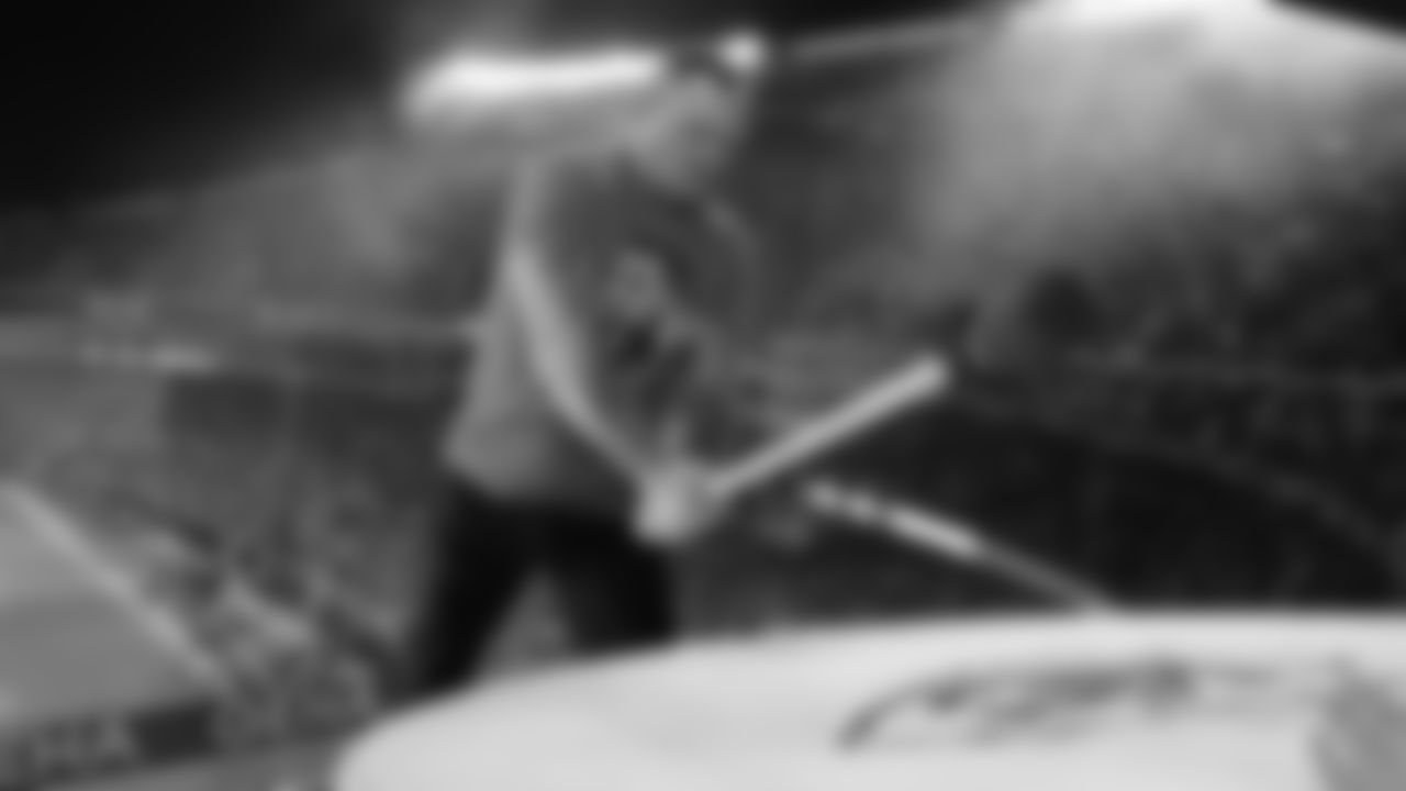 Kansas City Chiefs legend Tim Grunhard hits the drum prior to an NFL football game against the New York Giants, Monday, November 1, 2021 in Kansas City.