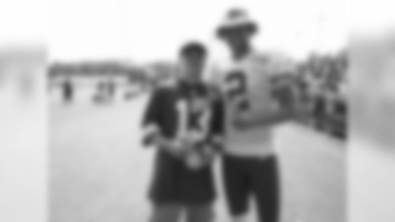 Kansas City Chiefs punter Dustin Colquitt (2) and Brayden the Gatorade Kid Experience winner during practice on 08/05/18 at Chiefs Training Camp at Missouri Western State University in St. Joseph, Missouri.
