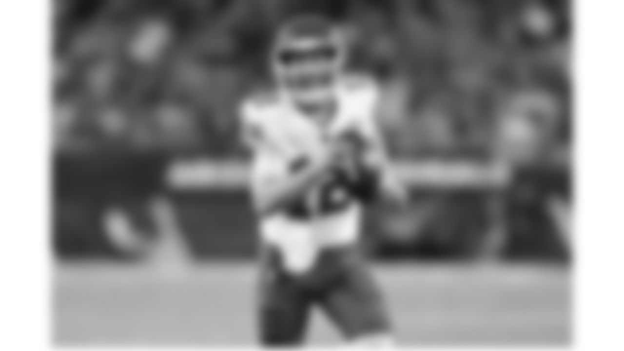 Kansas City Chiefs quarterback Shane Buechele (12) runs the ball during the game at the Chiefs preseason Week 2 matchup against the Arizona Cardinals on Saturday, August 19, 2023.
