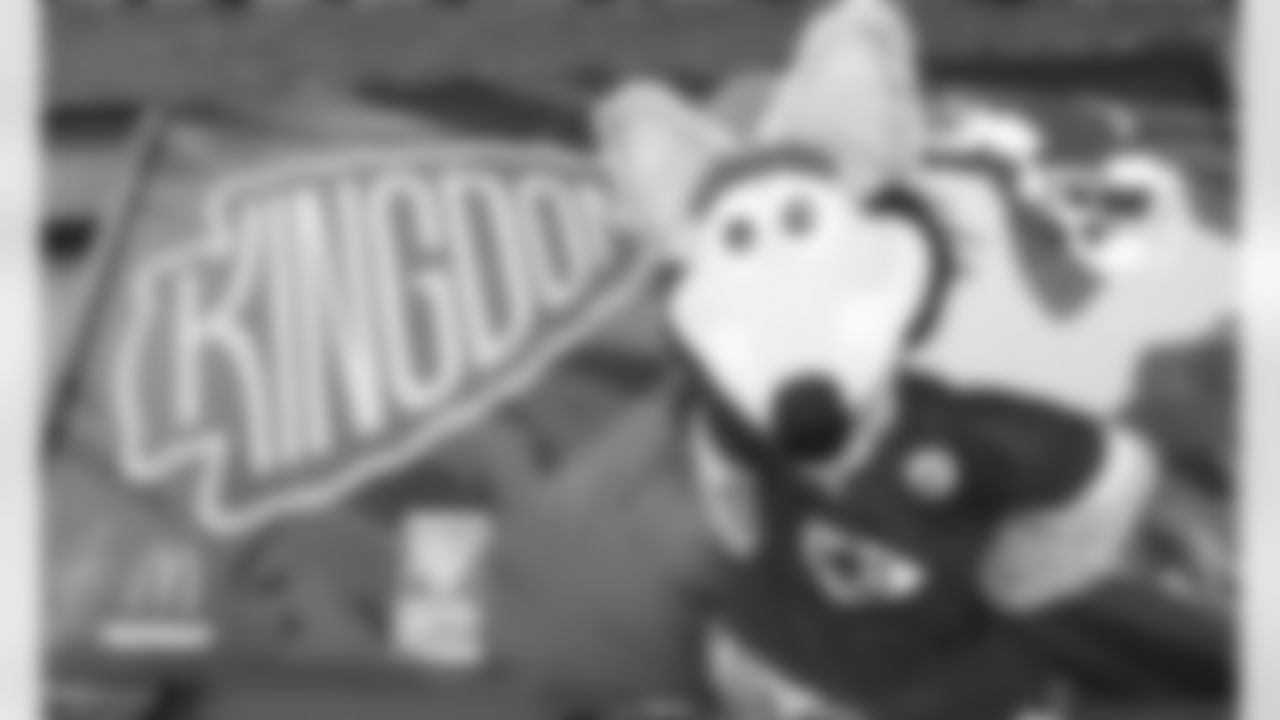 KC Wolf at the Chiefs Kingdom mural located near Krzyz Studio in the Crossroads district in Kansas City, MO