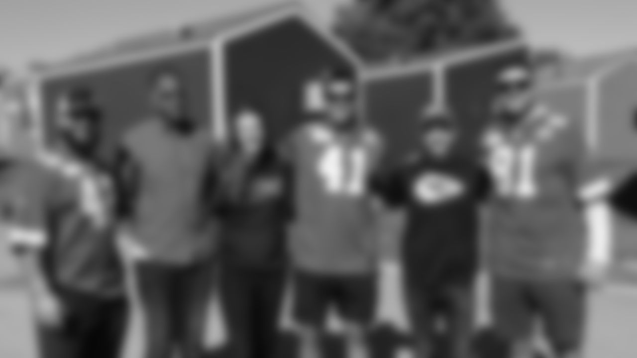 Chiefs players visit the Veterans Community Project to help put finishing touches on homes within the community, followed by a cookout with the residents of VCP. T