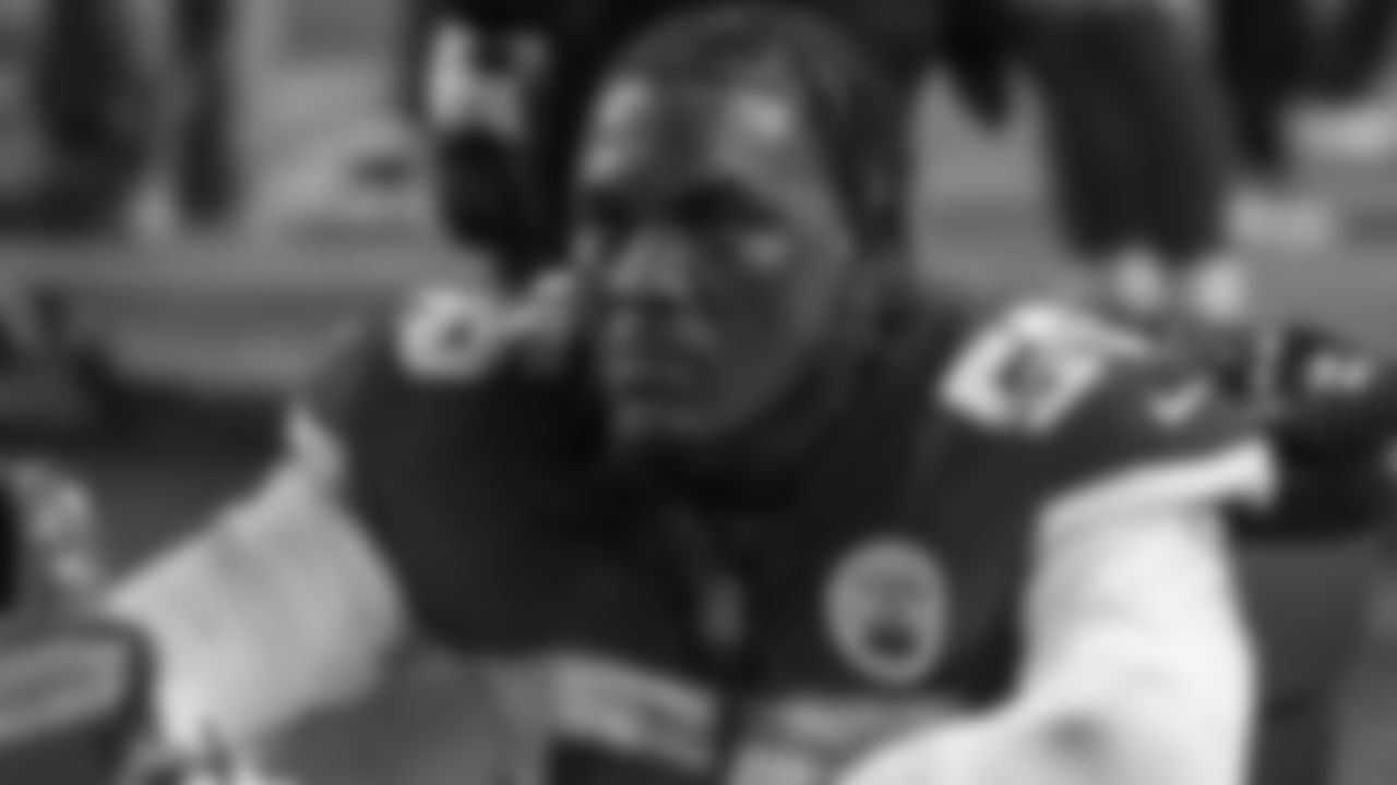 Kansas City Chiefs defensive end Frank Clark (55) sits on the sideline with 13 seconds left during the divisional playoff football game against the Buffalo Bills, Sunday, January 23, 2022 in Kansas City.