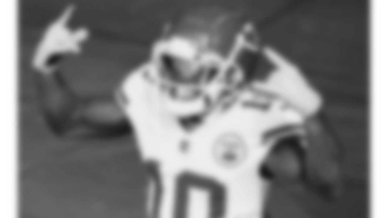 Kansas City Chiefs wide receiver Tyreek Hill (10) runs out of the tunnel prior to an NFL football game against the Tennessee Titans, Sunday, October 24, 2021 in Nashville.