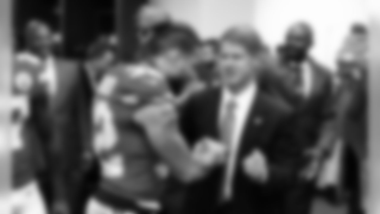 Kansas City Chiefs Safety Tyrann Mathieu (32) and Kansas City Chiefs Chairman and CEO Clark Hunt after the game between the Kansas City Chiefs and the Los Angeles Chargers at Arrowhead Stadium.