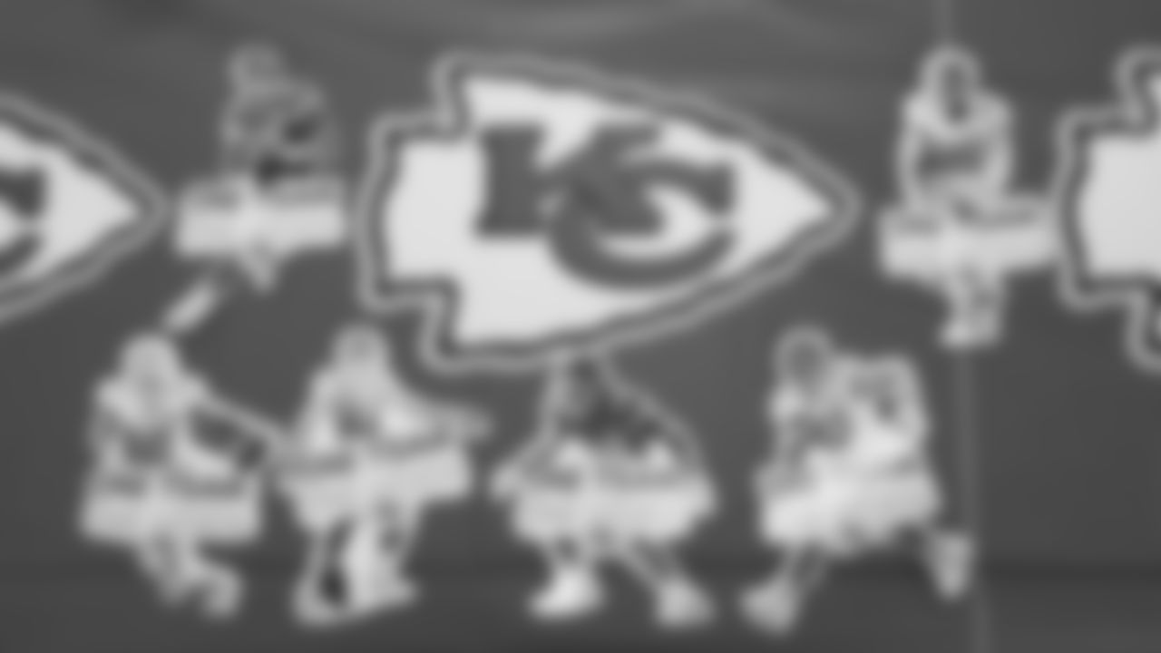 Kansas City Chiefs representatives help with the official kickoff event of the 2021 Playoffs at Hy-Vee on Monday, January 10, 2021 in Lee's Summit.