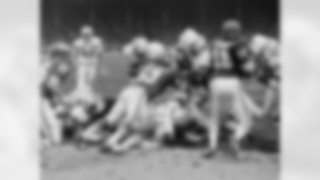 The 1971 AFC Divisional Playoff Game between the Kansas City Chiefs and the Miami Dolphins, played on Christmas day, was a seesaw battle of touchdowns and field goals that didn't end until halfway through a second overtime period. The marathon game lasted eighty-two minutes and forty seconds and by all accounts was one of the most exciting games ever played. The Chiefs went on to lose 24-27 in the second overtime.