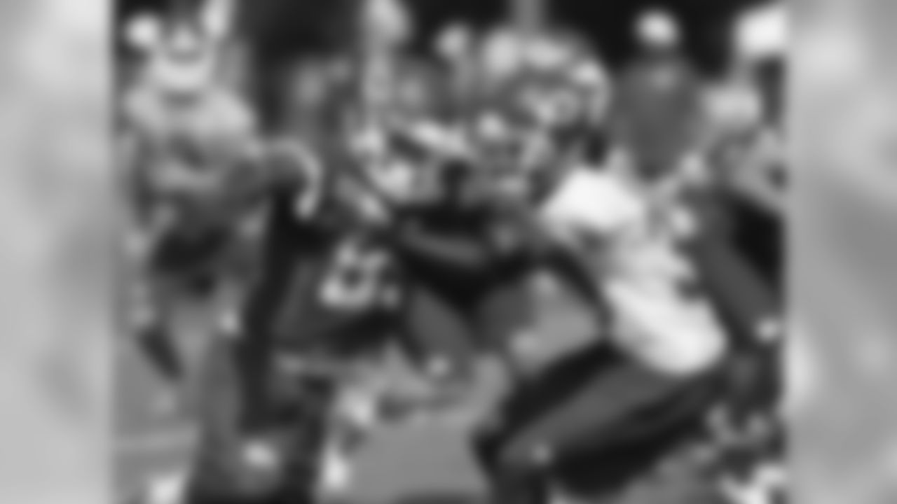 WR Frankie Hammond and CB Vernon Kearney fight at the line of scrimmage