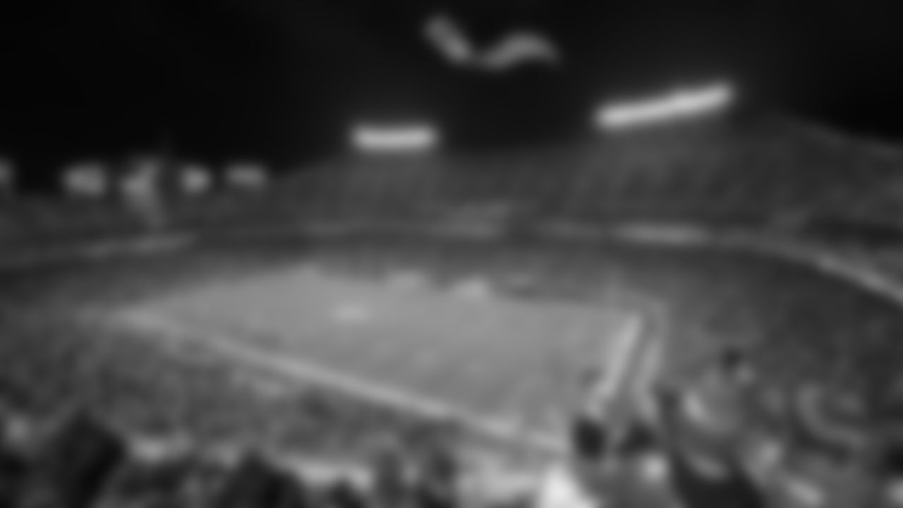 Wings of Blue parachute team prior to an NFL football game against the New York Giants, Monday, November 1, 2021 in Kansas City.