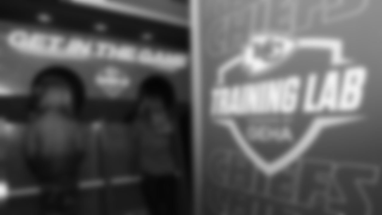 Kansas City Chiefs representatives help with the official kickoff event of the 2021 Playoffs at Hy-Vee on Monday, January 10, 2021 in Overland Park.