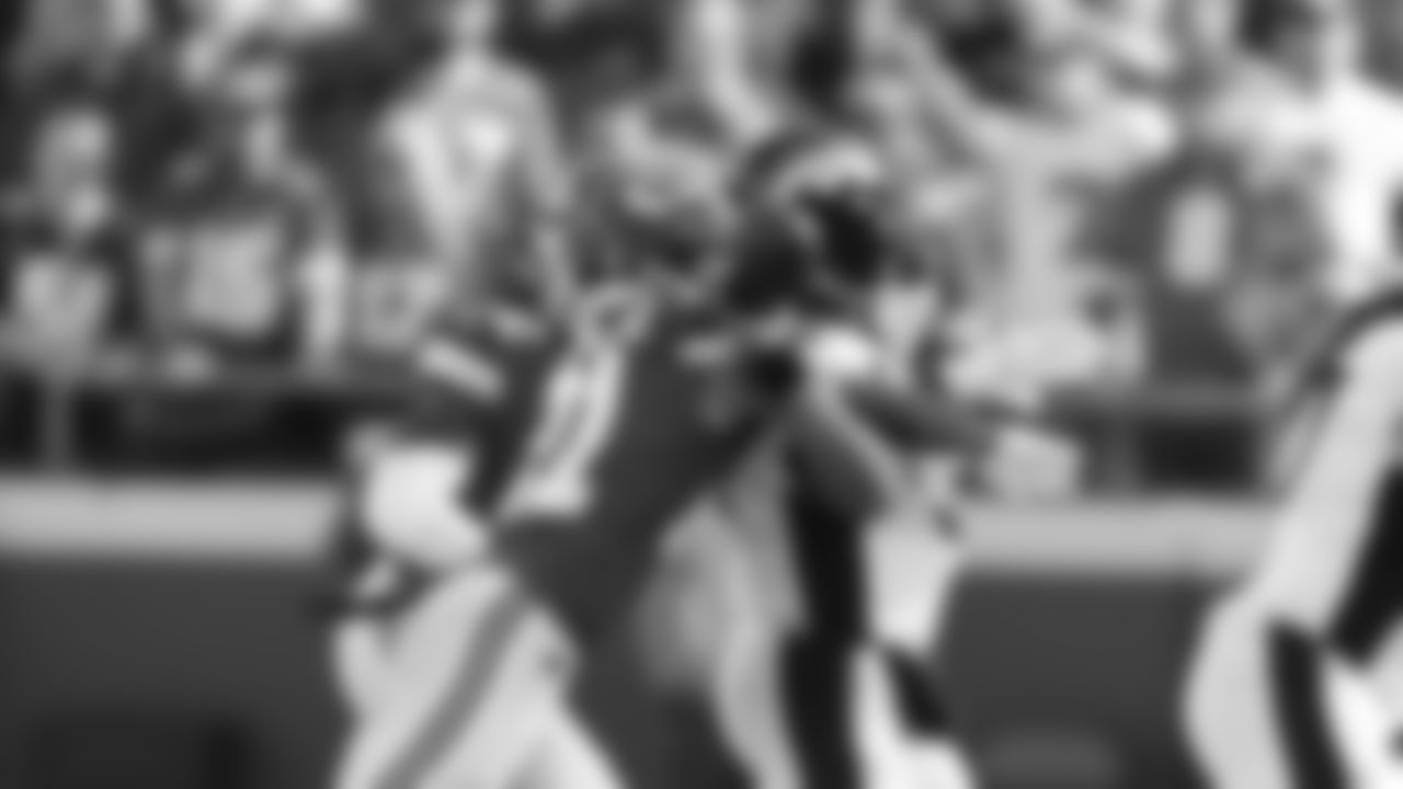 Kansas City Chiefs corner back Trent McDuffie (21) with a strip sack during an NFL football game against the Denver Broncos, Sunday January 1, 2023 in Kansas City.