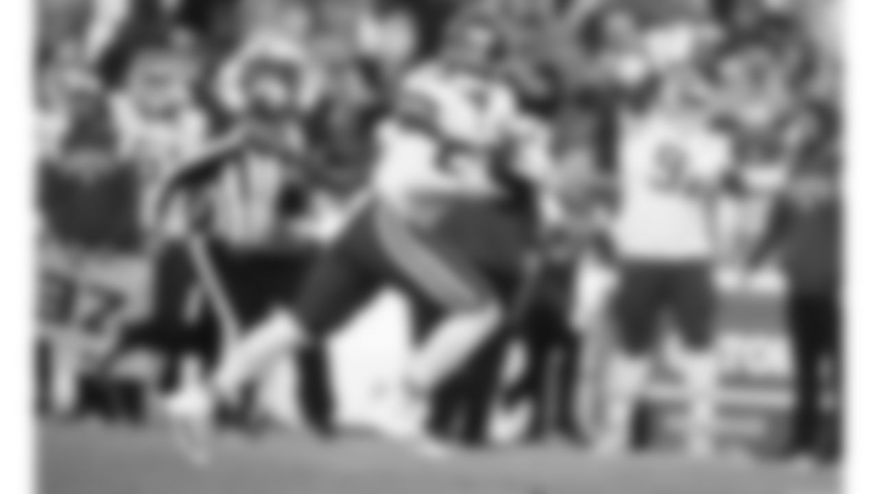 Kansas City Chiefs linebacker Willie Gay Jr. (50) runs for the end zone after intercepting a pass during an NFL football game against the Denver Broncos, Sunday, December 11, 2022 in Denver.