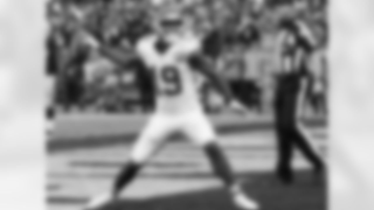 Kansas City Chiefs wide receiver Jeremy Maclin (19) throws the ball down on the Raiders logo after touchdown