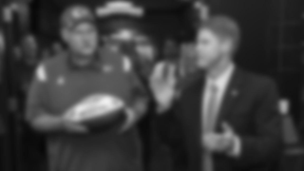 Kansas City Chiefs head coach Andy Reid receives a game ball in the locker room from Chiefs Owner and CEO Clark Hunt after an NFL football game against the Kansas City Chiefs, Sunday, September 26, 2021 in Philadelphia.