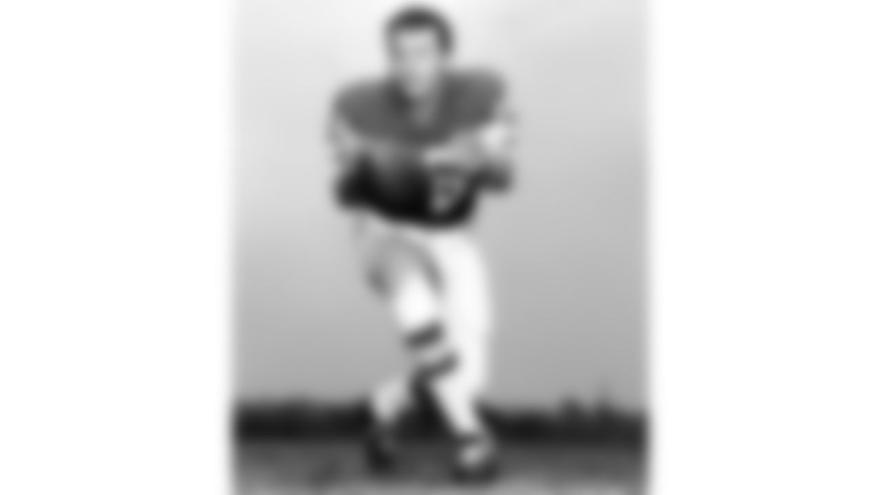 Len Dawson (16) poses for an action photograph.
