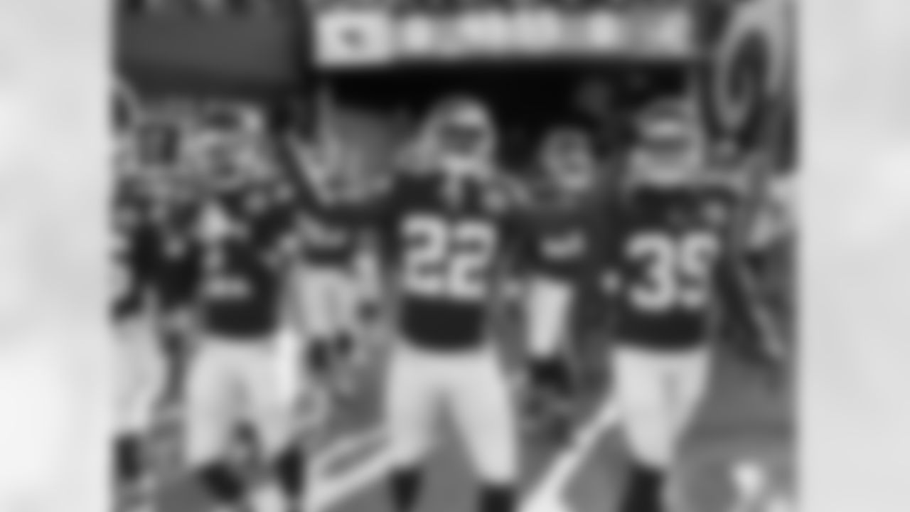 Members of the Kansas City Chiefs, including defensive back Marcus Peters (22), walk out to the field prior to the preseason game against the Los Angeles Rams at the Los Angeles Memorial Coliseum on Saturday, August 20, 2016.