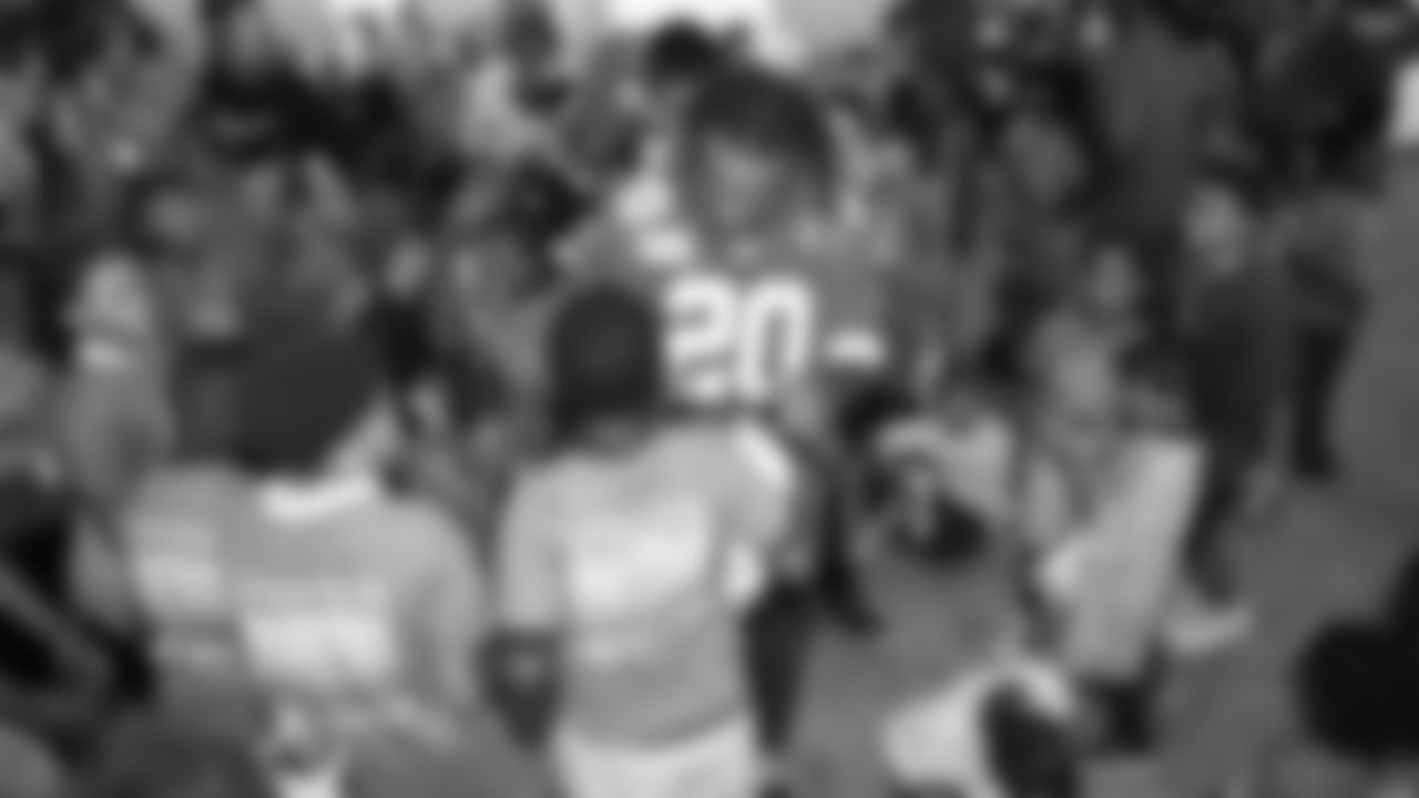 Kansas City Chiefs safety Justin Reid (20) with TeamSmile for their annual Oral Health Youth Clinic at GEHA Field at Arrowhead Stadium. Thursday, September 27, 2022.