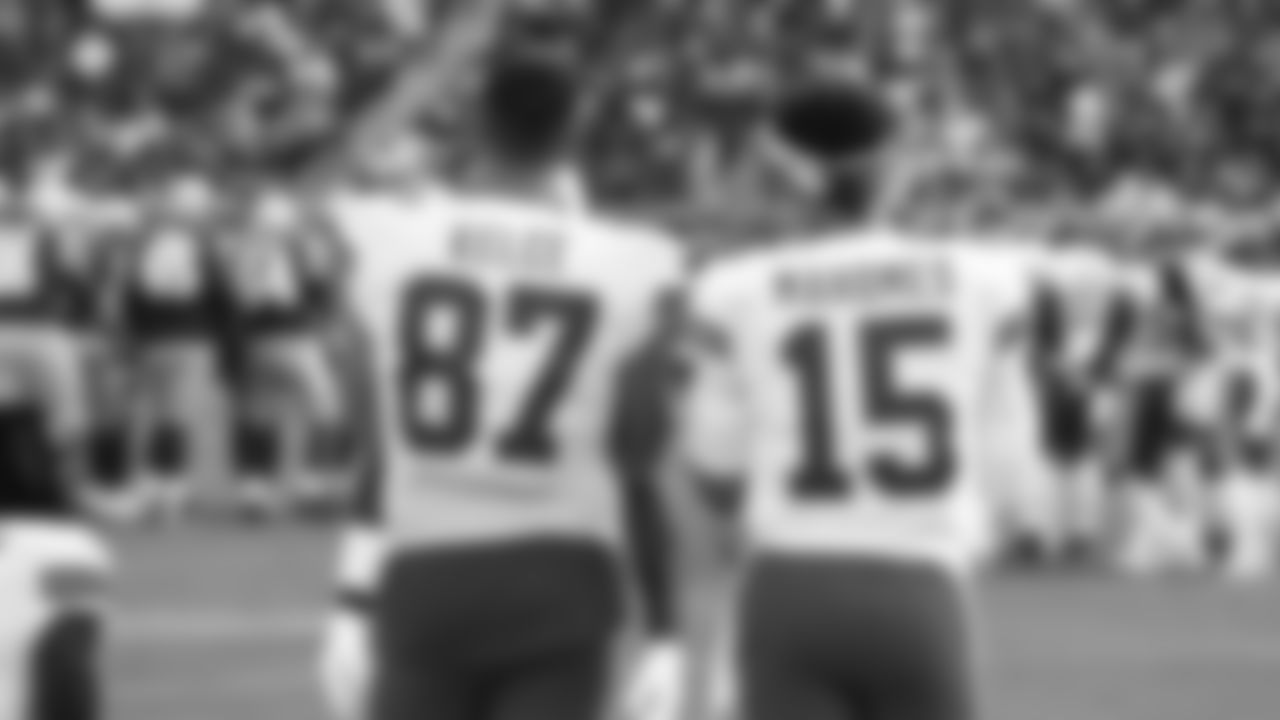 Kansas City Chiefs tight end Travis Kelce (87) and quarterback Patrick Mahomes (15) talk on the sideline during an NFL preseason football game against the San Francisco 49ers, Saturday, August. 14, 2021 in Santa Clara.