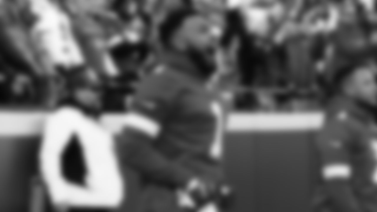 A flag runner celebrates during the AFC Championship football game against the Cincinnati Bengals, Sunday, January 30, 2022.