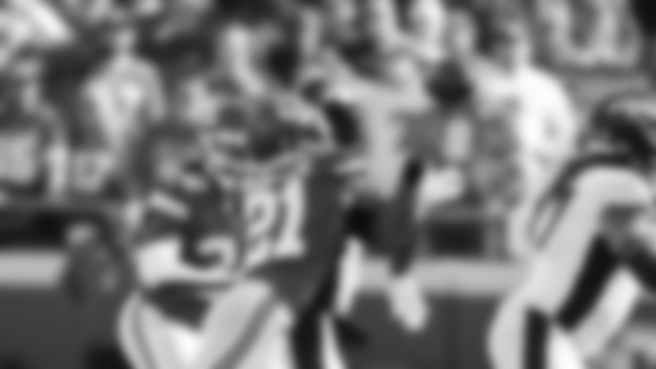 Kansas City Chiefs corner back Trent McDuffie (21) with a strip sack during an NFL football game against the Denver Broncos, Sunday January 1, 2023 in Kansas City.