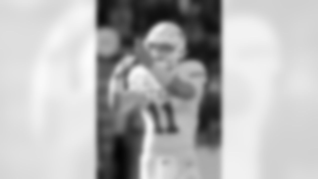 Texas quarterback Sam Ehlinger (11) calls a time out in an NCAA college football game against Baylor in an NCAA college football game Saturday, Nov. 23, 2019, in Waco, Texas. (AP Photo/Richard W. Rodriguez)