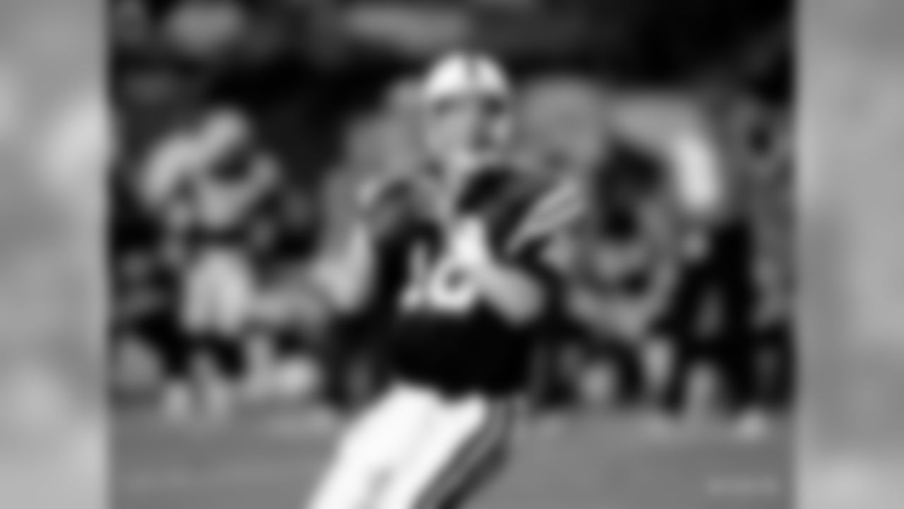 Indianapolis Colts quarterback Peyton Manning (18) is seen in action during an NFL game against the Miami Dolphins Dec. 17, 2000, at Pro Player Stadium in Miami Gardens, Fla. The Colts defeated the Dolphins 20Ð13. (Allen Kee via AP)