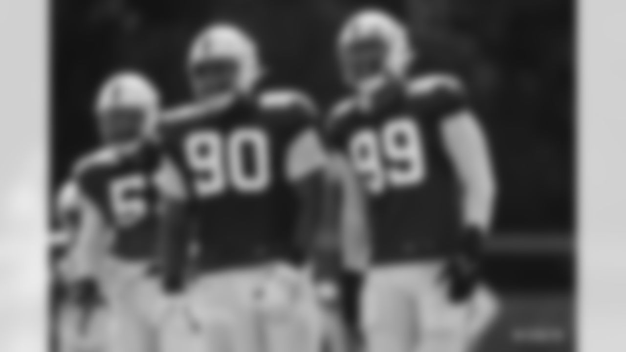 90 DT Grover Stewart, #99 DT DeForest Buckner