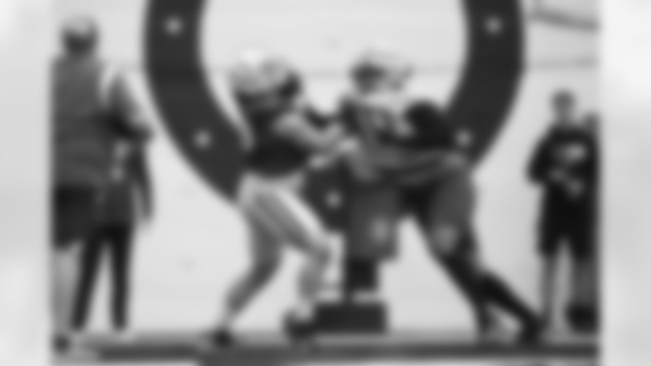 78 C Ryan Kelly, #90 DT Grover Stewart