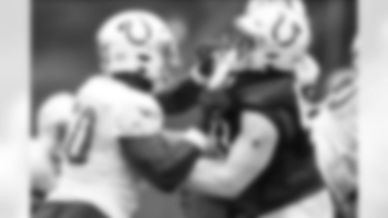 50 DE Justin Houston, #41 TE Farrod Green