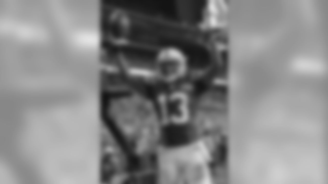 Indianapolis Colts wide receiver T.Y. Hilton celebrates a touchdown against the Cleveland Browns during the second half of a preseason NFL football game in Indianapolis, Saturday, Aug. 24, 2013. (AP Photo/AJ Mast)