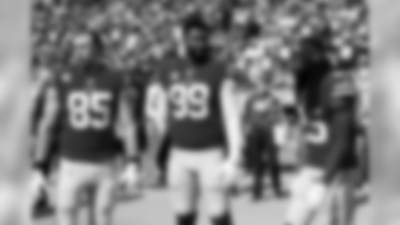 San Francisco 49ers team captains tight end George Kittle (85), defensive tackle DeForest Buckner (99) and cornerback Richard Sherman (25) wait on the sideline for the coin toss prior to an NFL football game against the Los Angeles Rams, Sunday, Oct. 13, 2019, in Los Angeles. The 49ers defeated the Rams, 20-7. (Ryan Kang via AP)